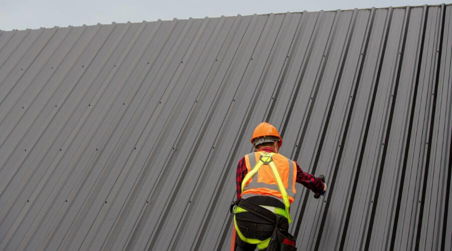 Professional metal roof installation services in Dorchester, IA